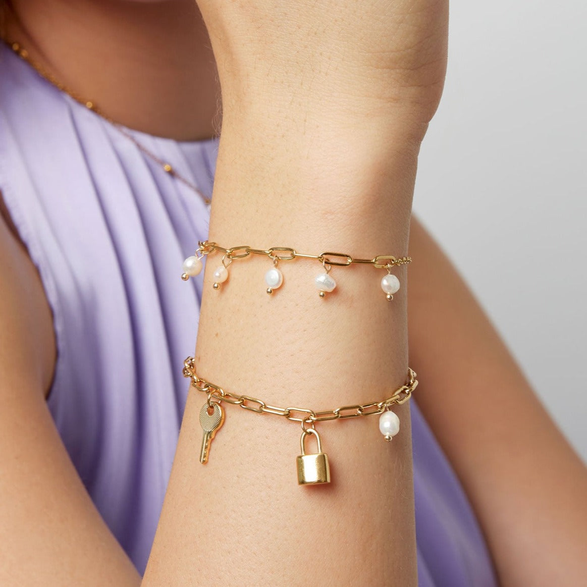 Bedel armband met slotje en sleutel bedel goud stainless steel