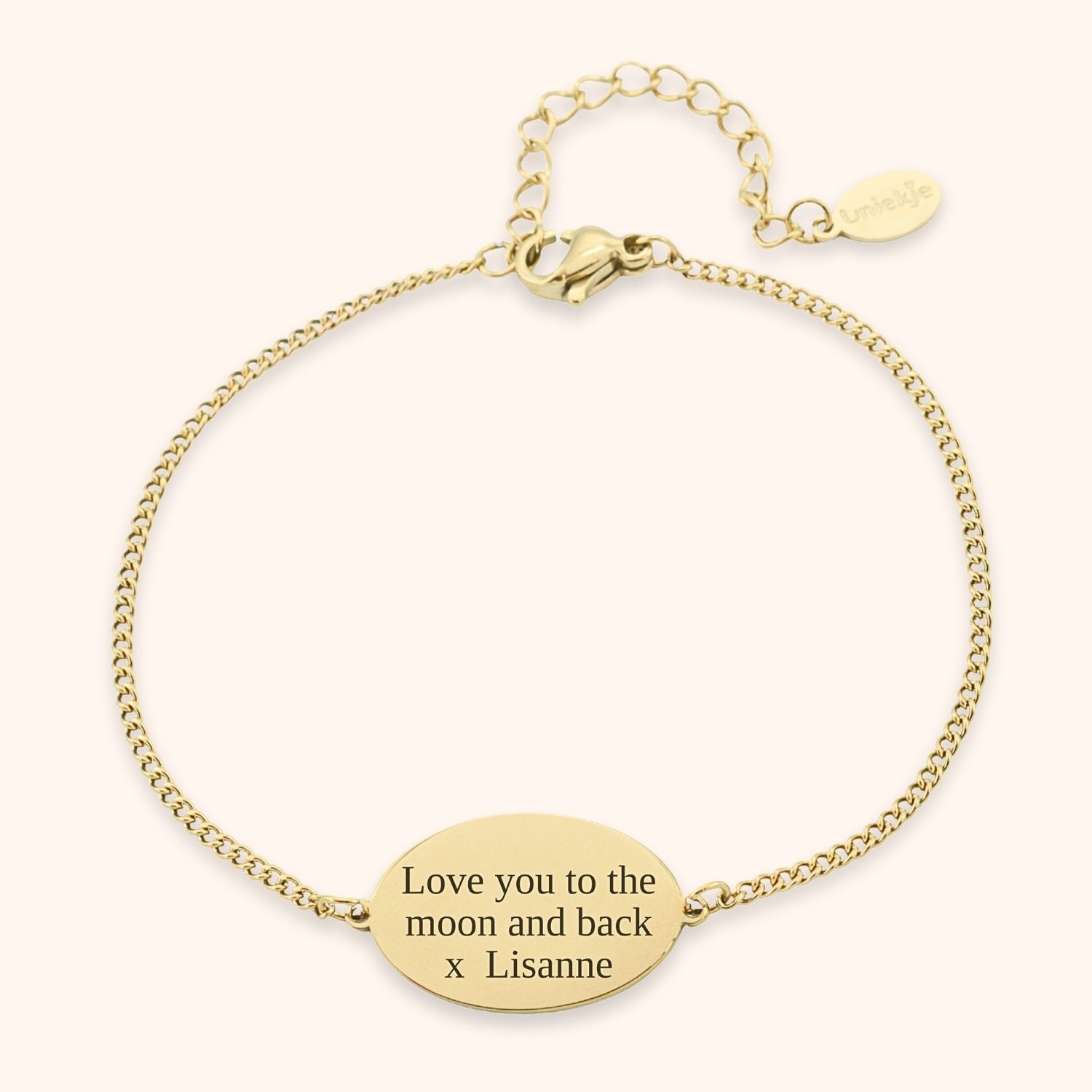 Gepersonaliseerde armband met eigen tekst graveren op ovaal plaatje goud stainless steel