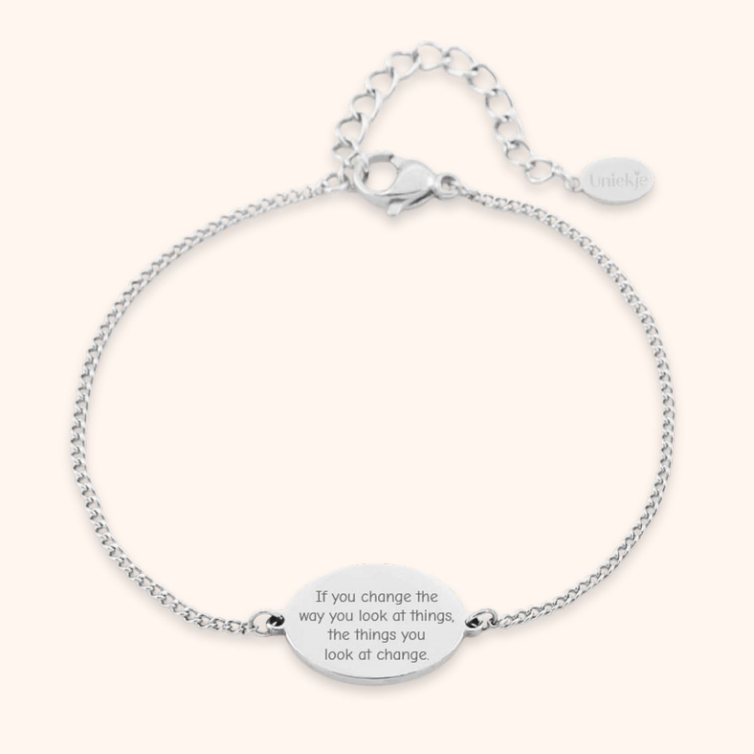 Gepersonaliseerde armband met eigen tekst graveren op ovaal plaatje zilver stainless steel