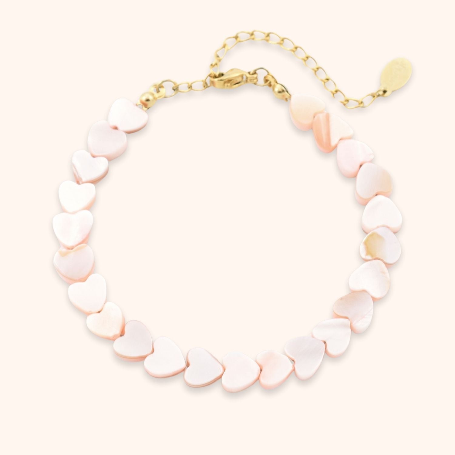 Armband goud hartjes schelpen kralen roze rvs