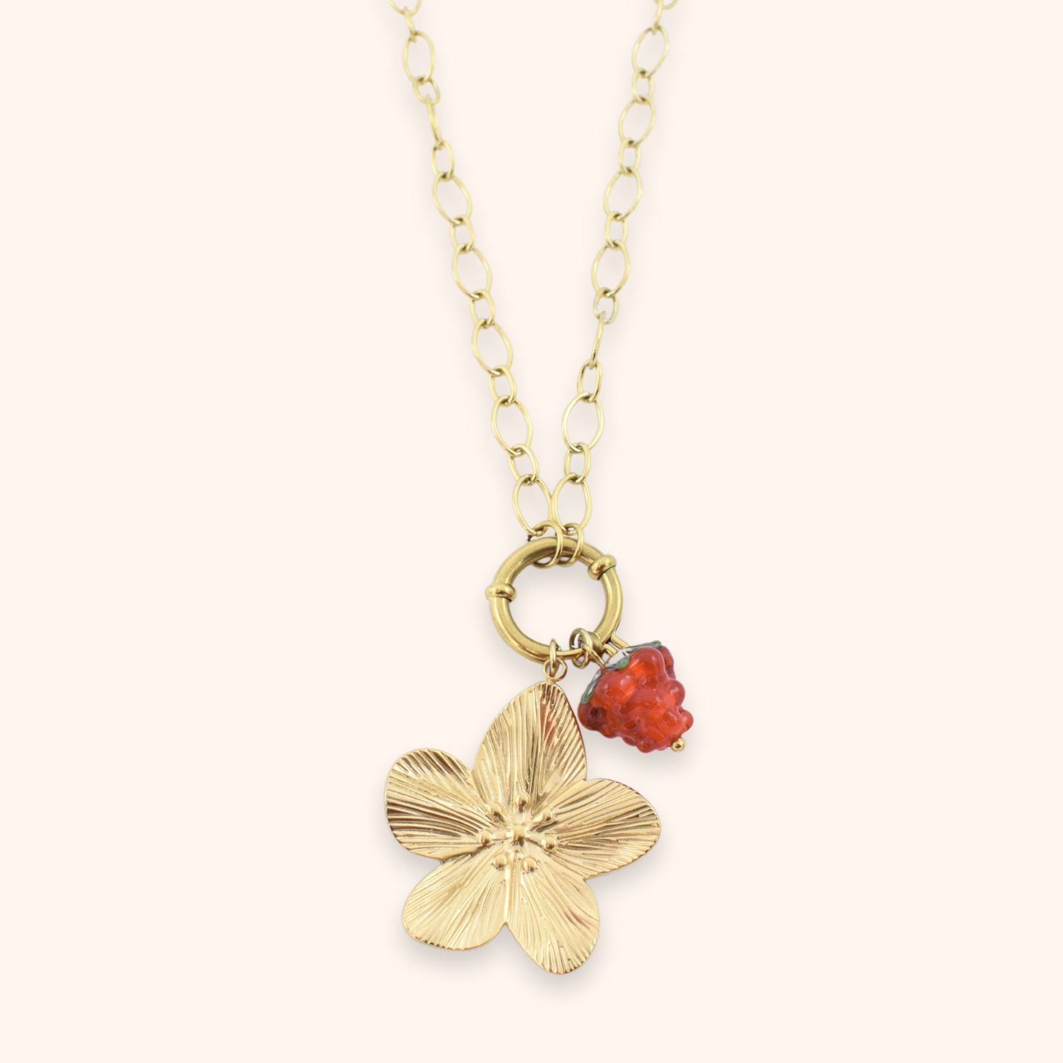 Bloem bedel ketting framboos kleur goud stainless steel