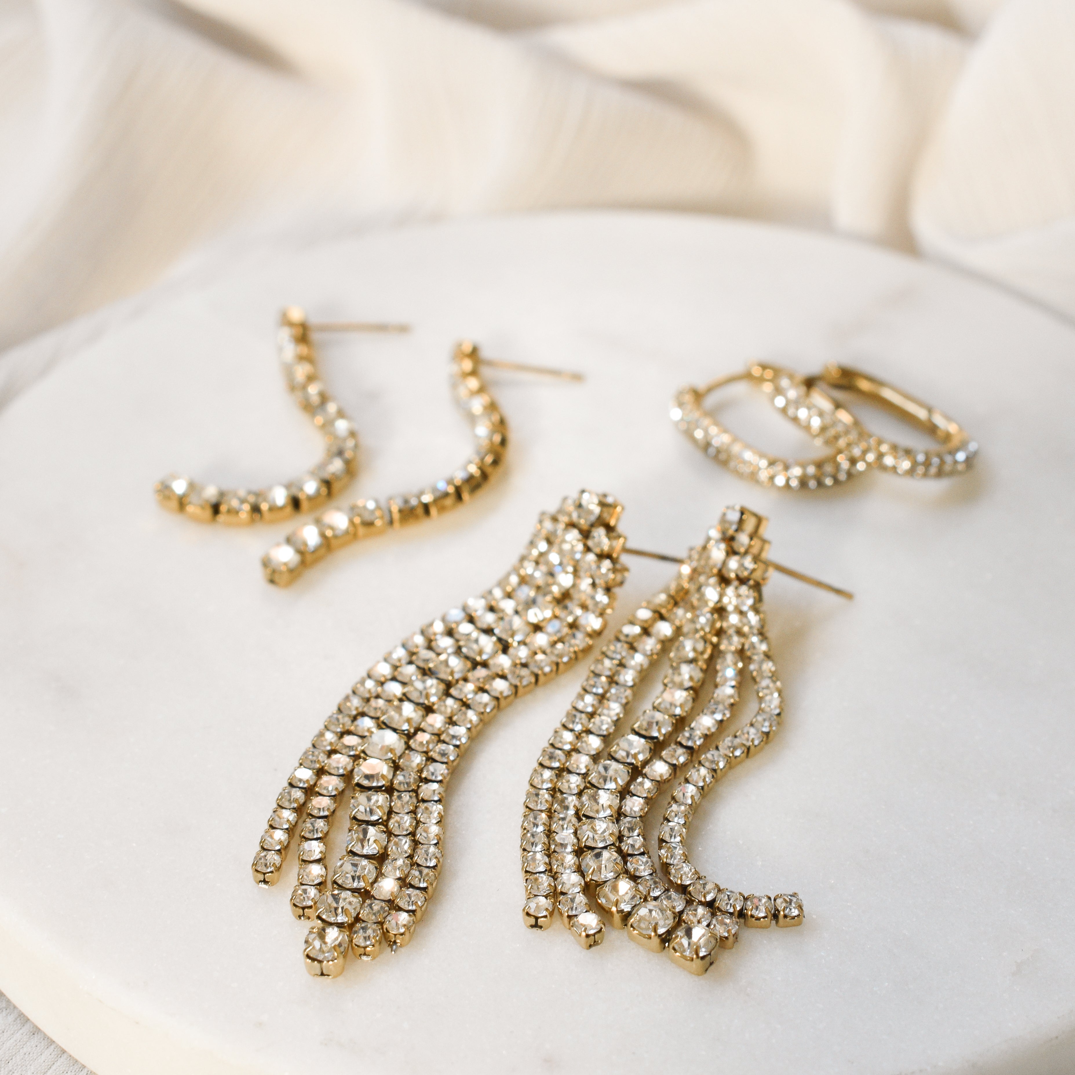 lange party strass statement oorknopjes goud