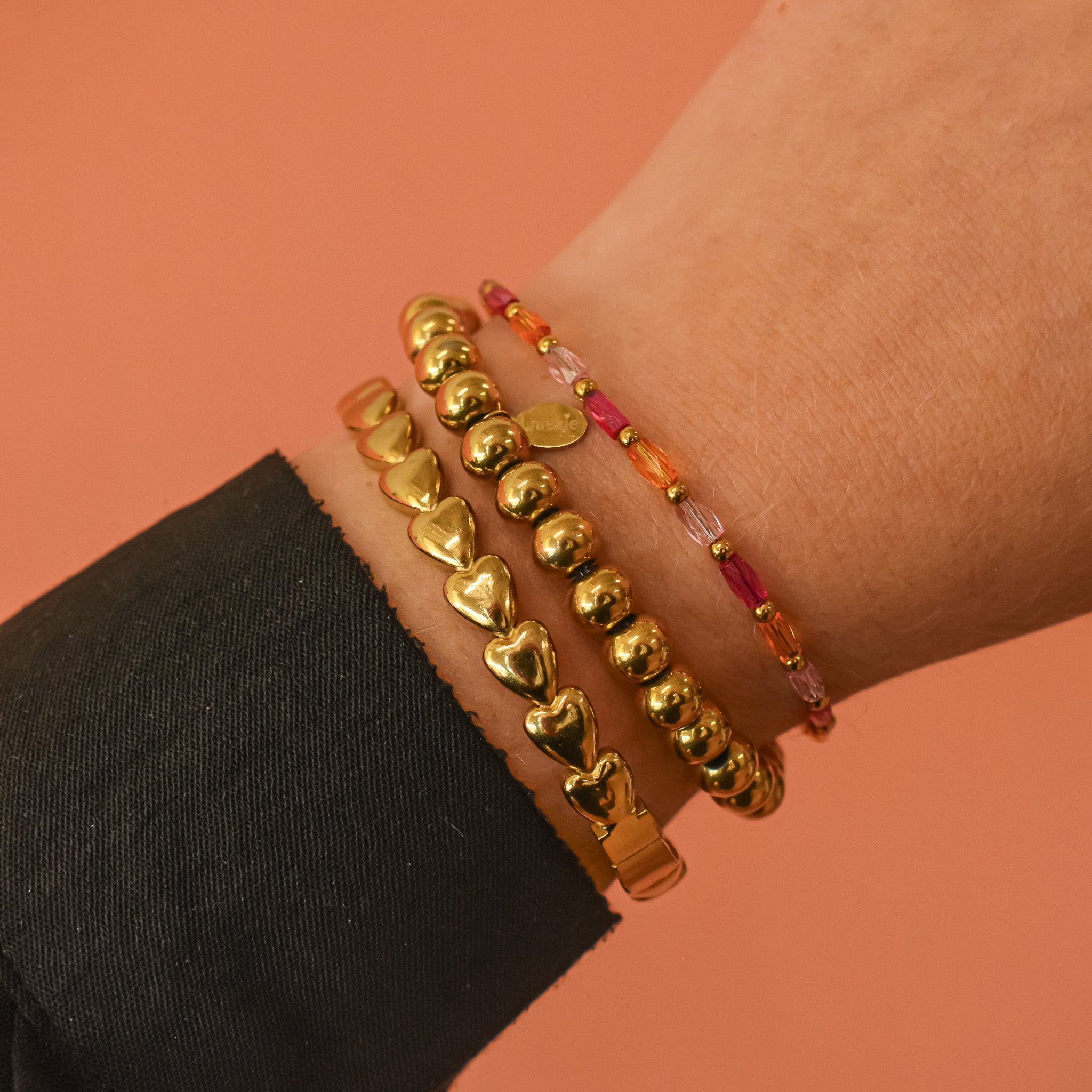 Kleurrijk kralen armbandje roze oranje