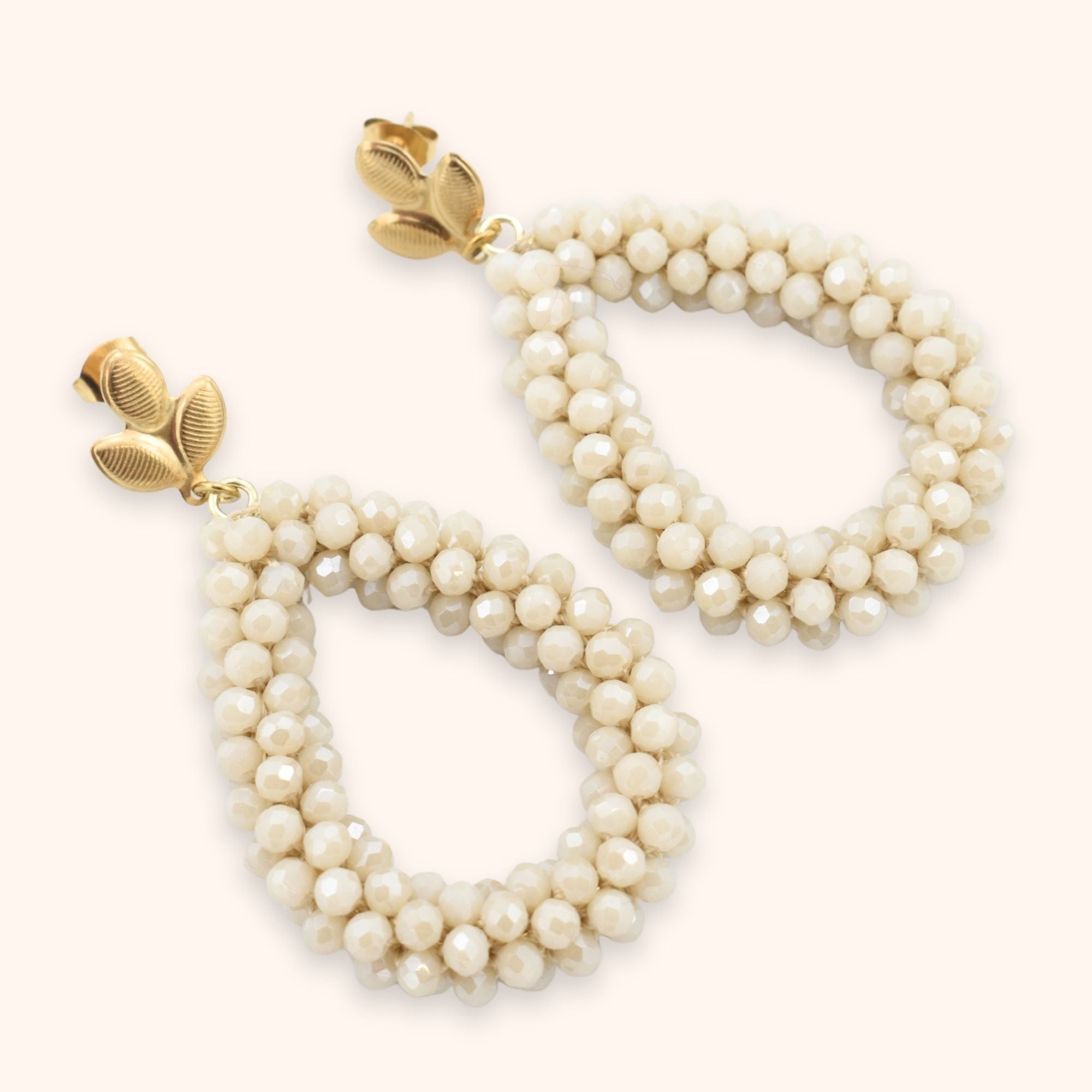 Statement oorbellen druppel beige