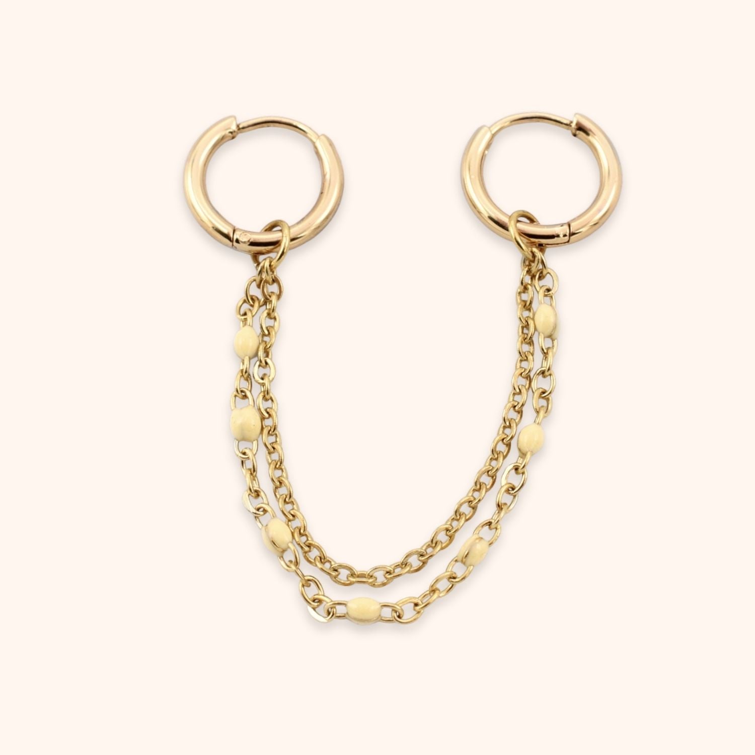Dubbele oorring ketting beige goud rvs