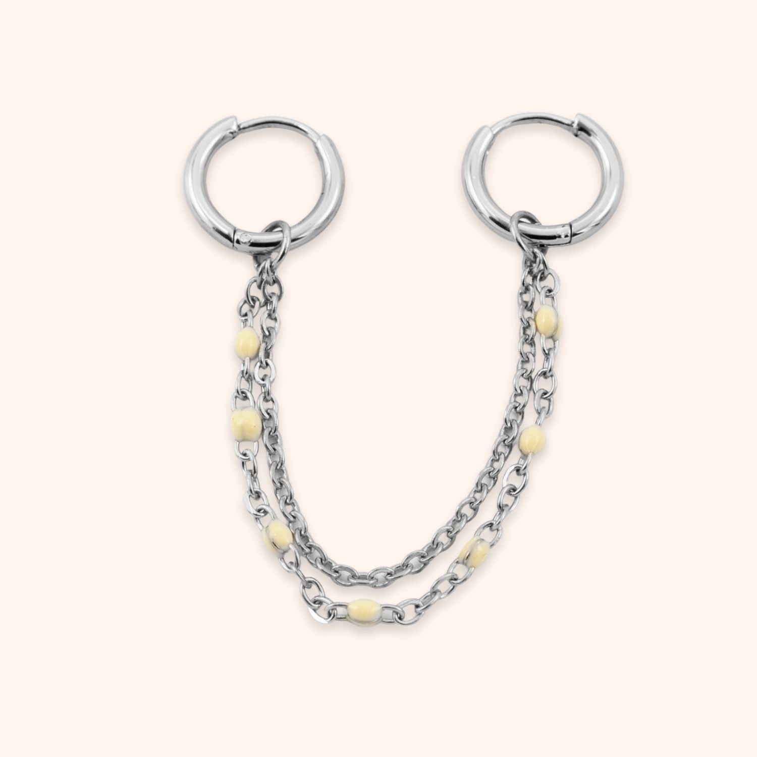 Dubbele oorring ketting beige zilver rvs