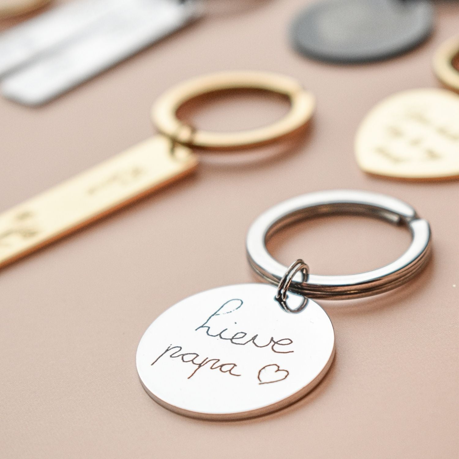 Sleutelhanger munt handgeschreven tekst