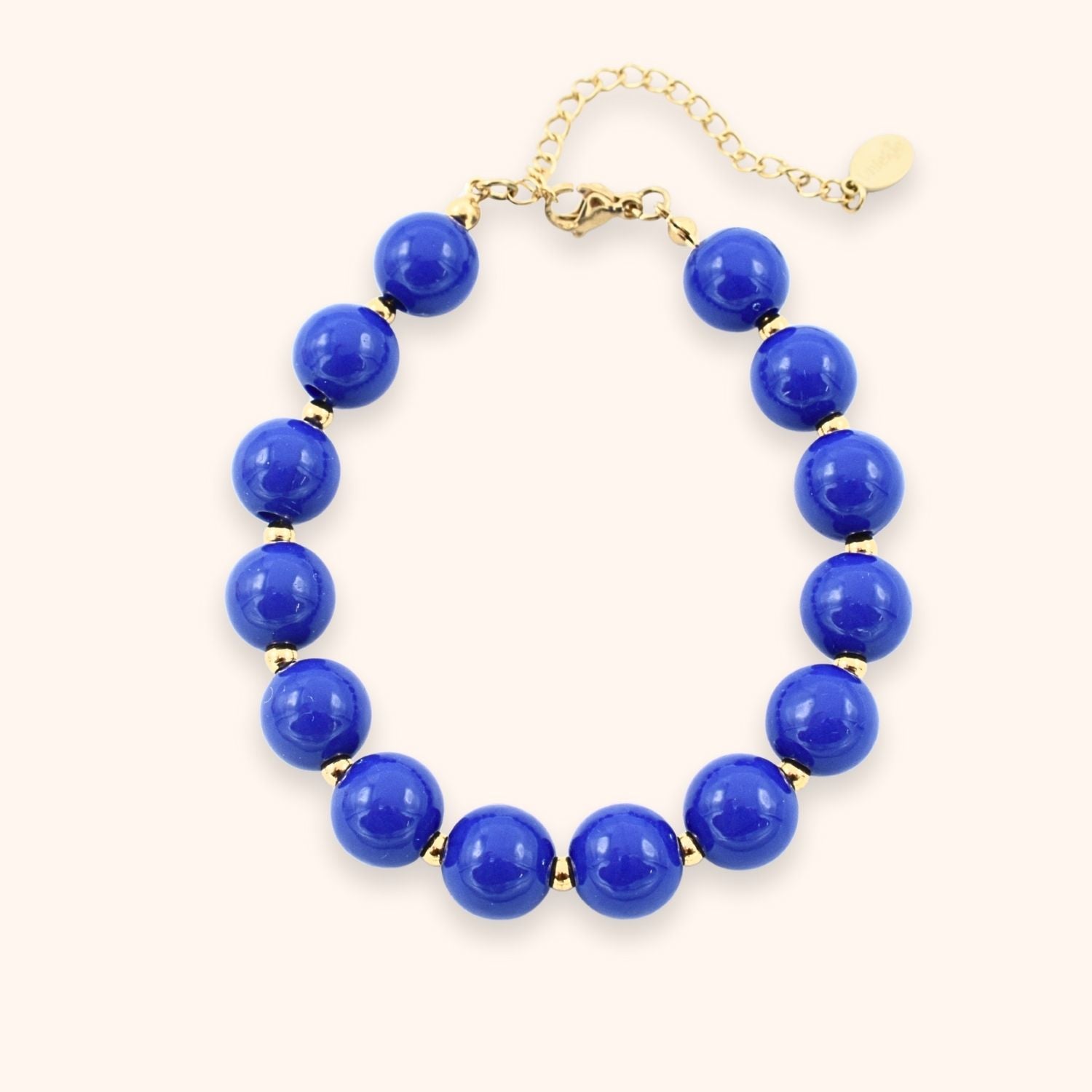 Grote donker blauwe kralen armband kleur goud stainless steel