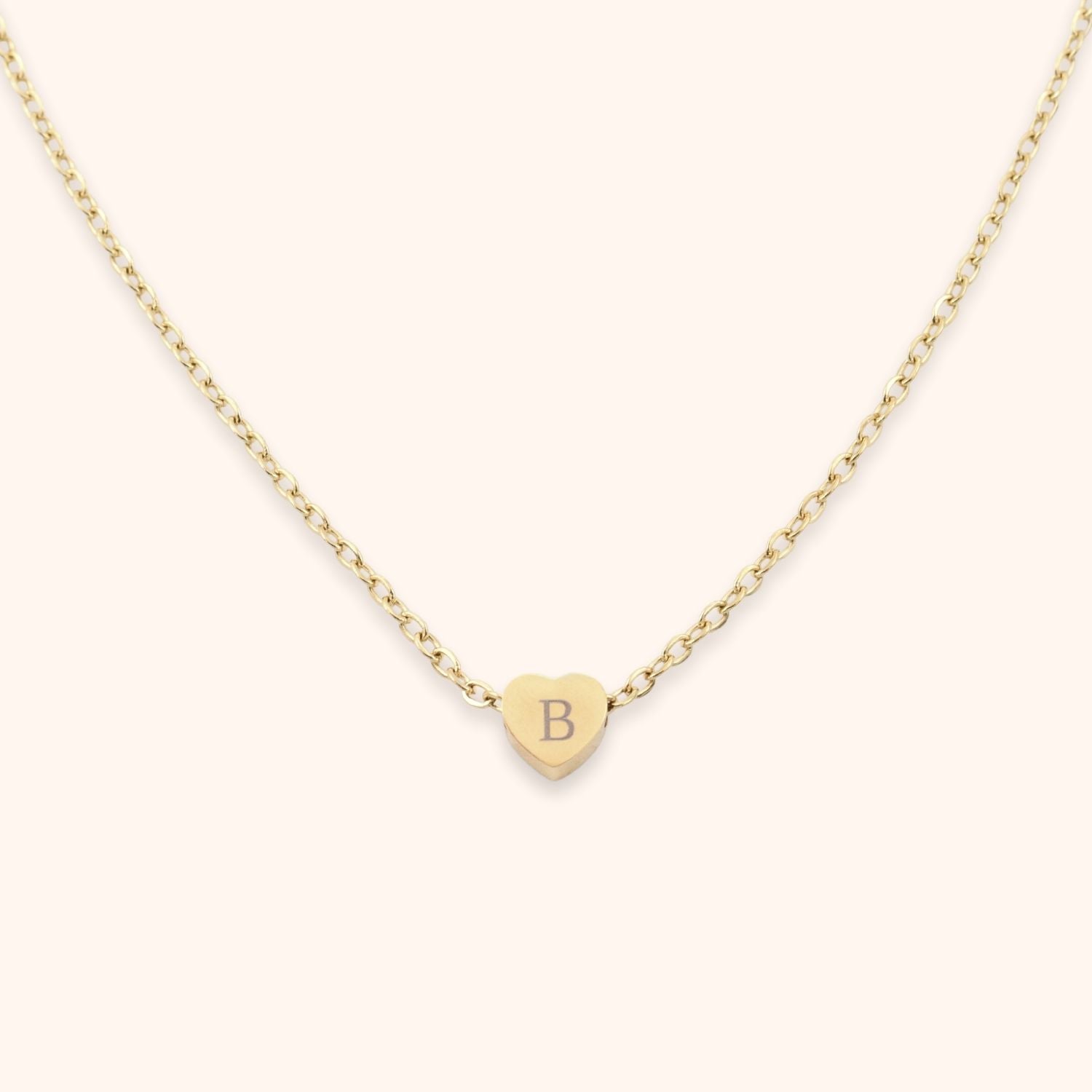 Initiaal ketting hartje gegraveerd goud rvs