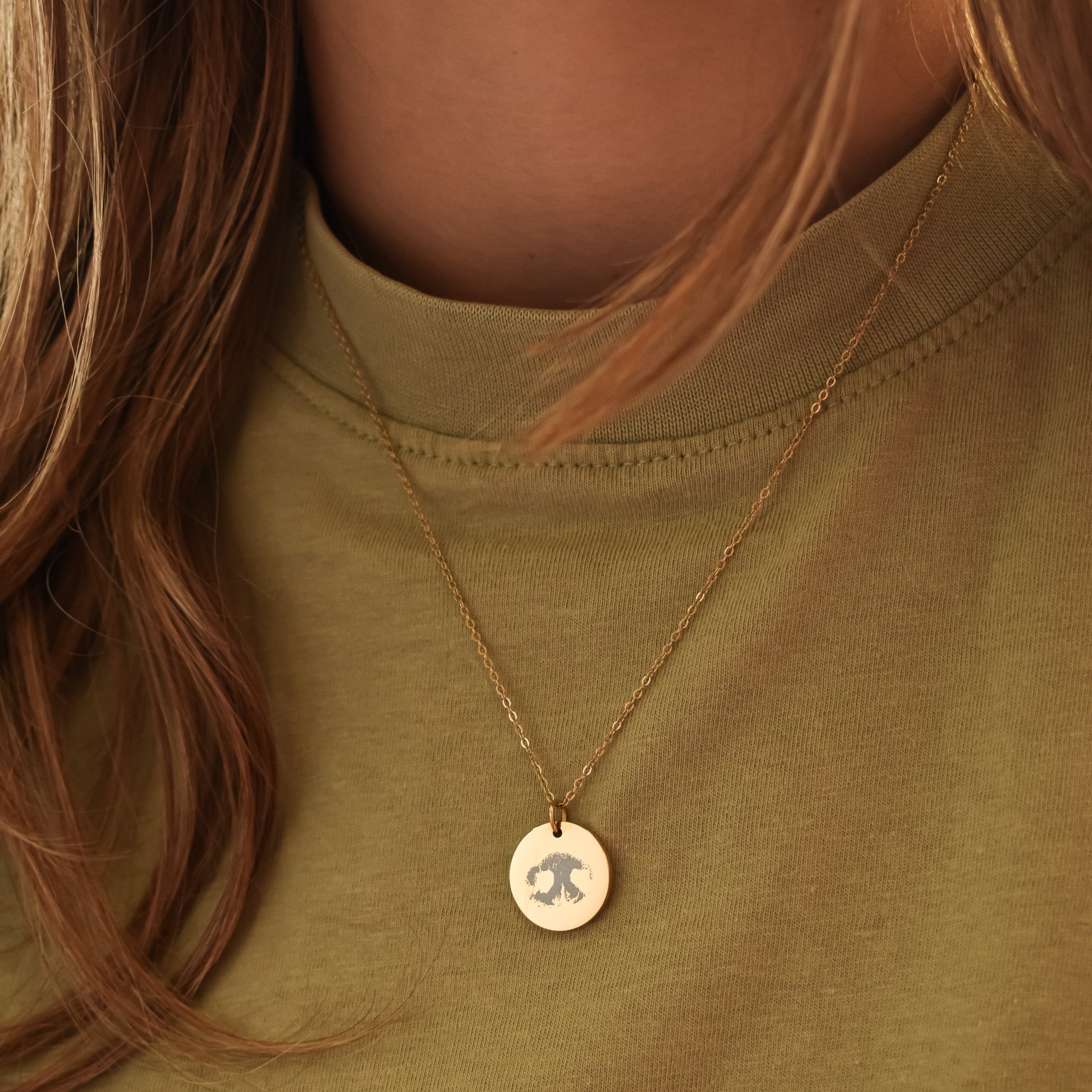 Ketting gegraveerd met een neusafdruk van een hond goud stainless steel