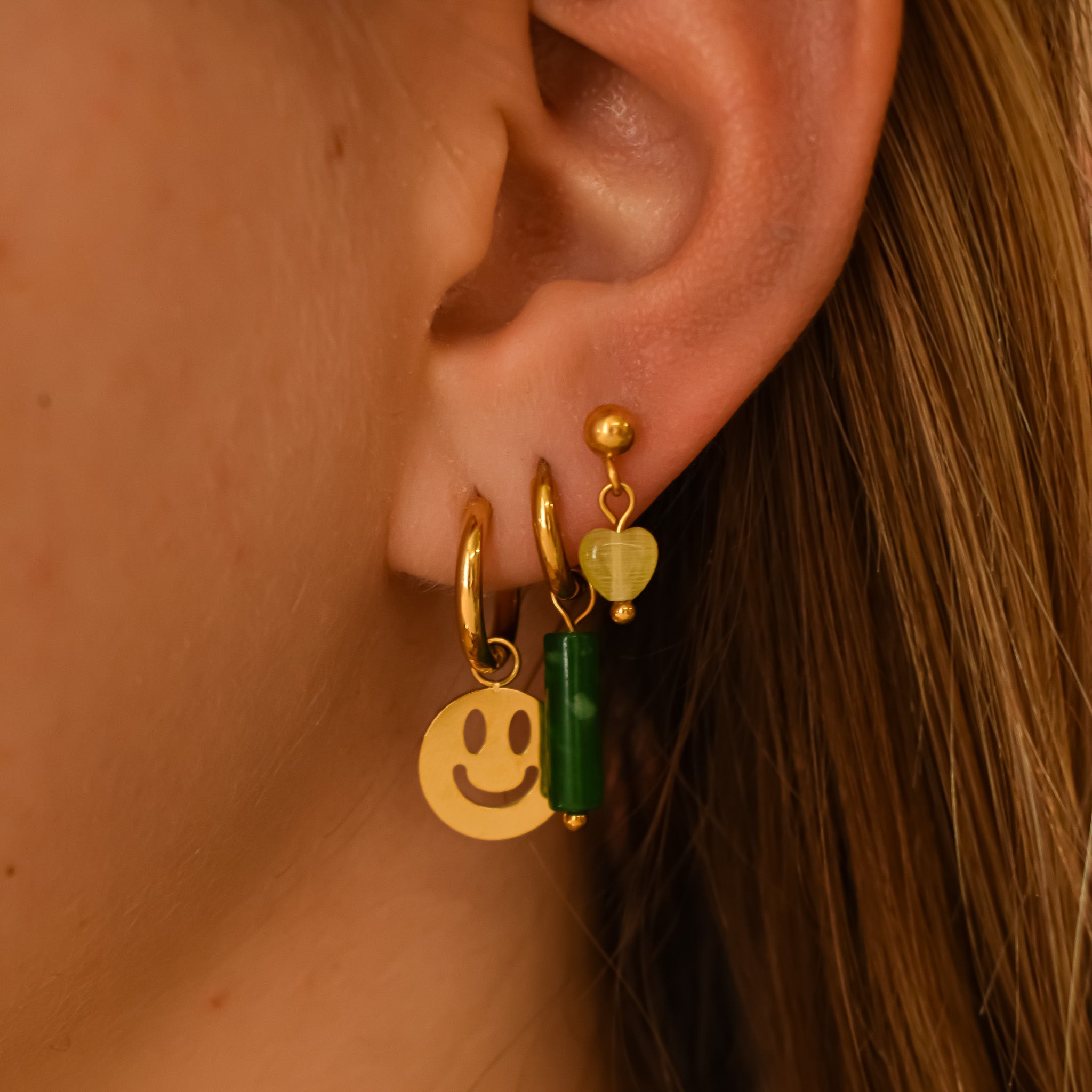 Kleurrijke oorbellen set 3 gaatjes smiley kleur goud stainless steel