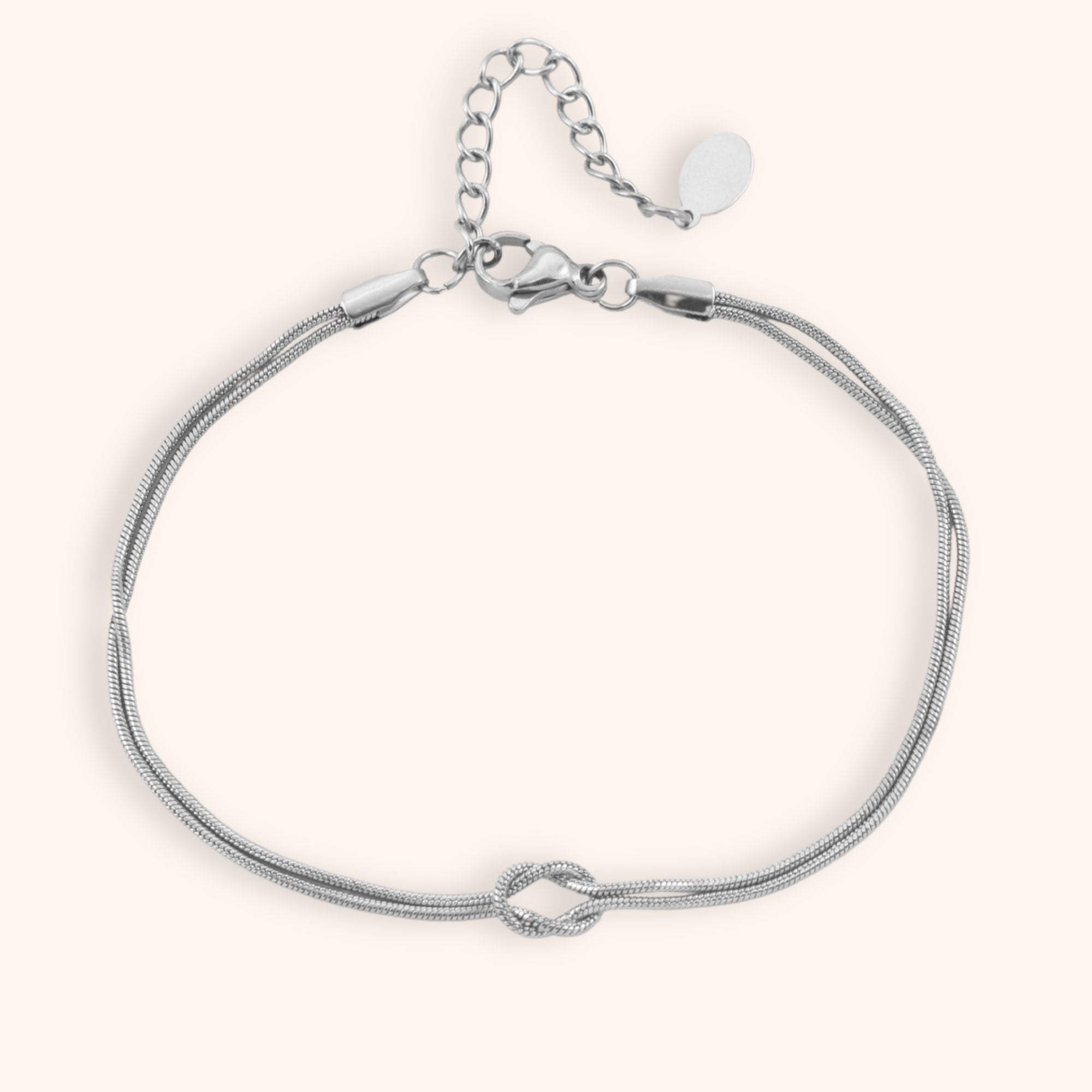 Armbandje verbonden knoopje