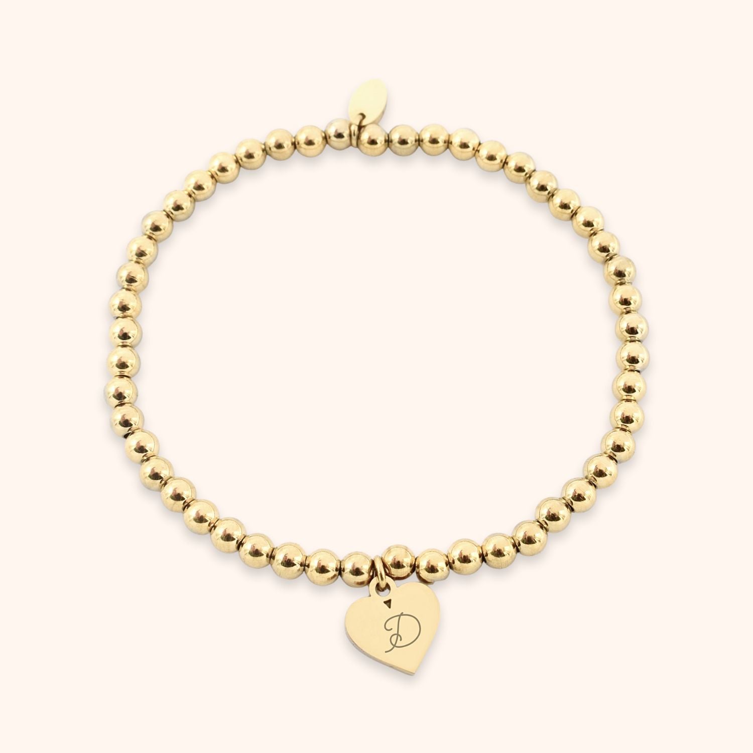 Elastische kralen armband gepersonaliseerd met 1 of 2 letters op een hartje goud rvs