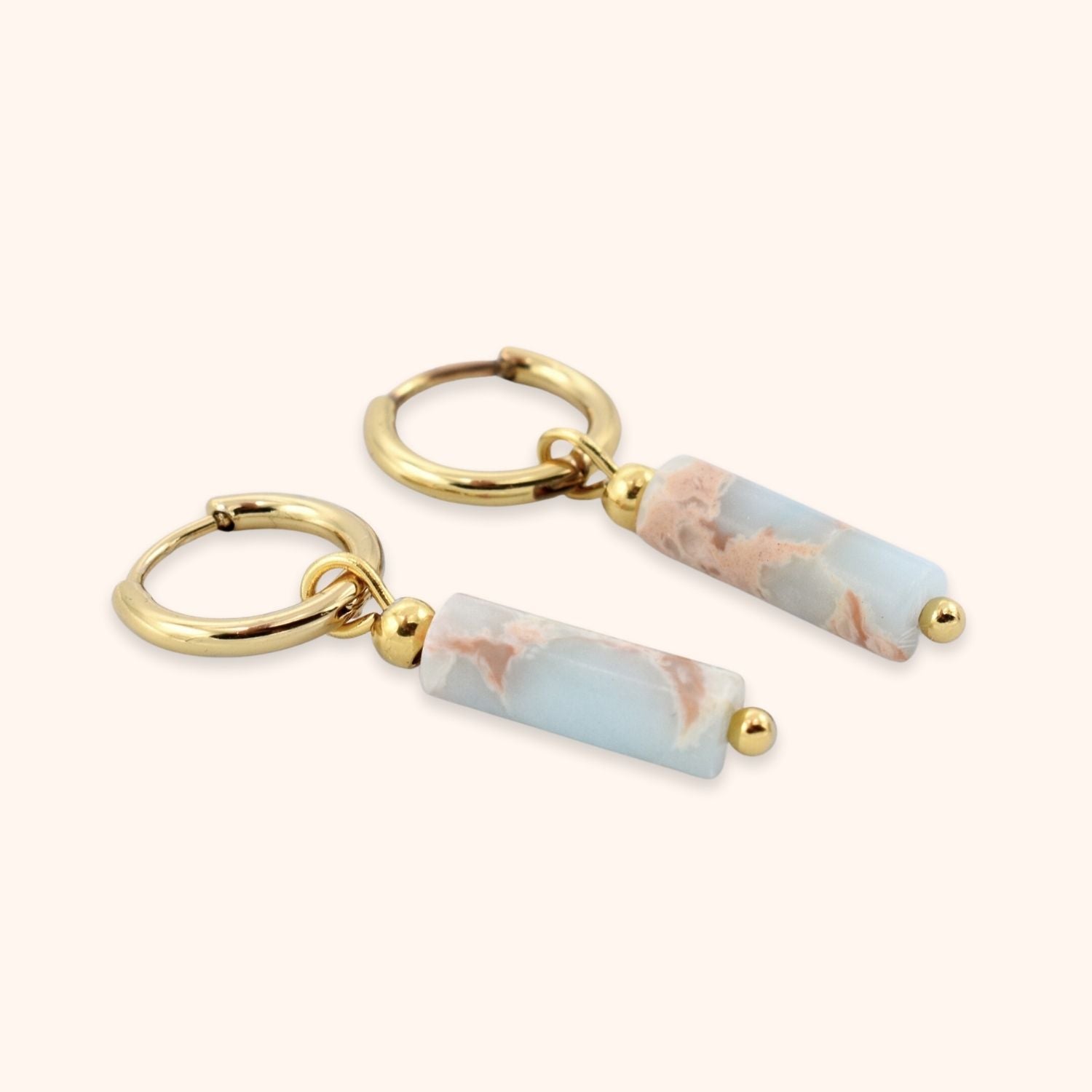Oorbellen hanger blauw kraaltje goud