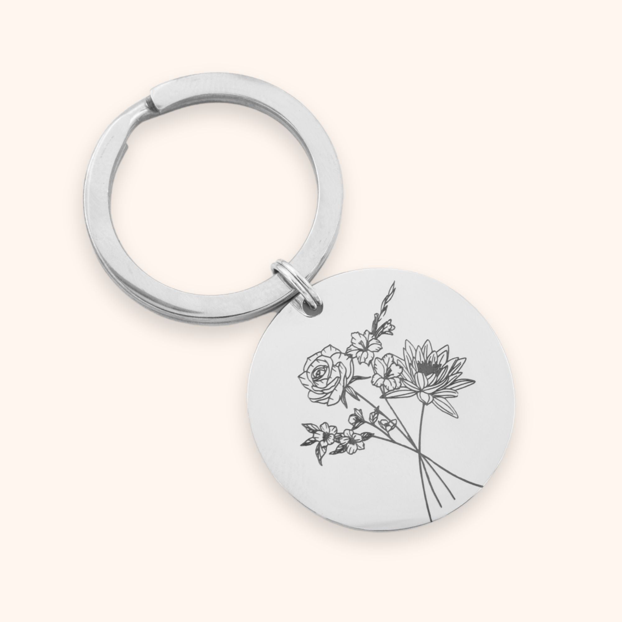 Ronde sleutelhanger gepersonaliseerd met meerdere geboortebloemen zilver rvs