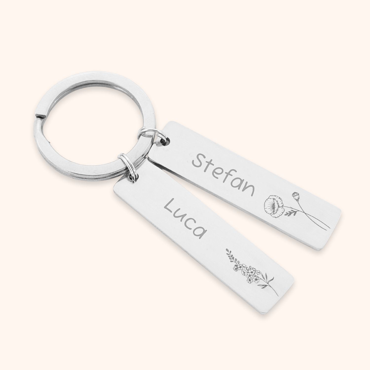 Sleutelhanger met 2 namen en geboortebloemen zilver