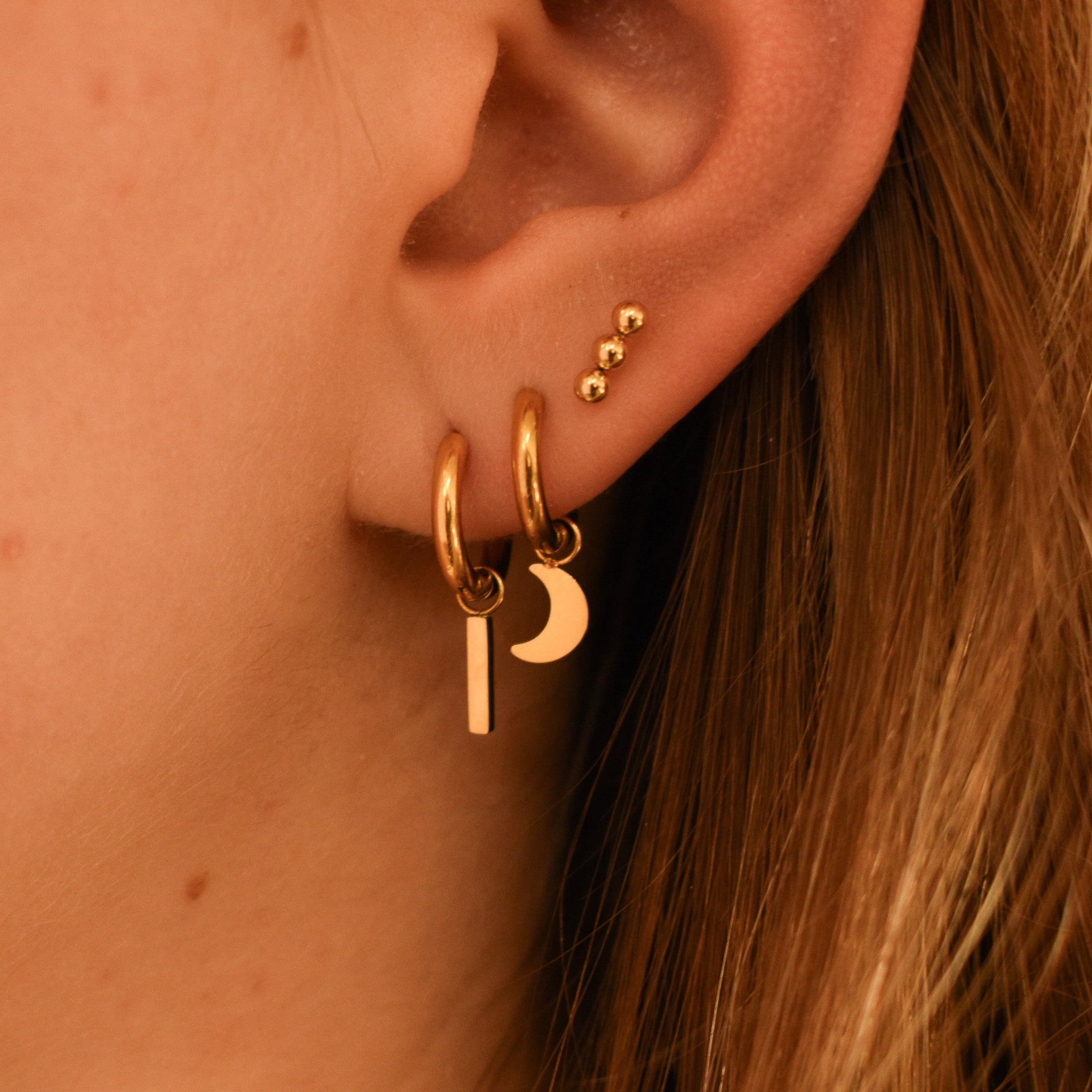 knopjes staafje balletjes goud setje in oor stainless steel