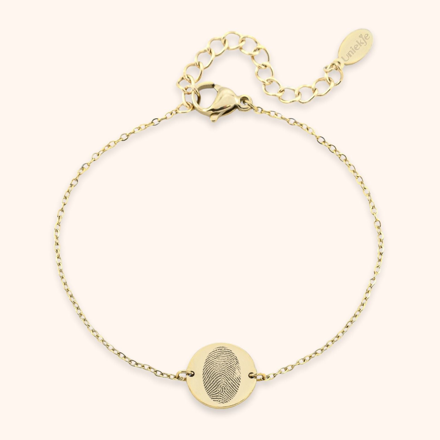 Dames armband gepersonaliseerd met vingerafdruk op muntje goud stainless steel