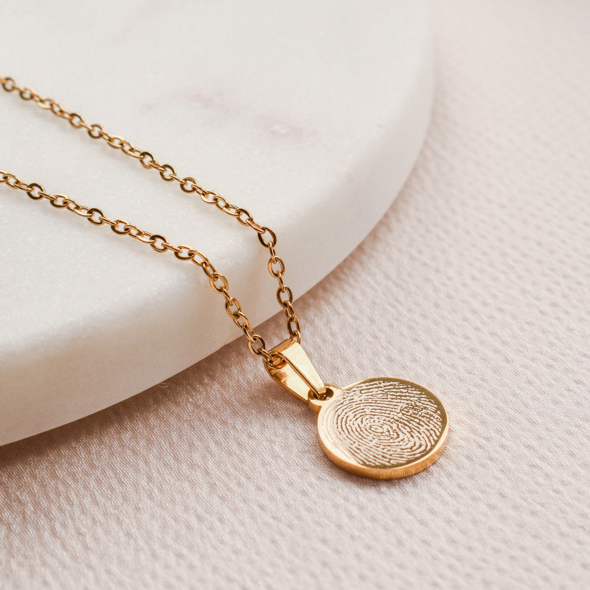 Ketting met vingerafdruk op ronde hanger stainless steel goud