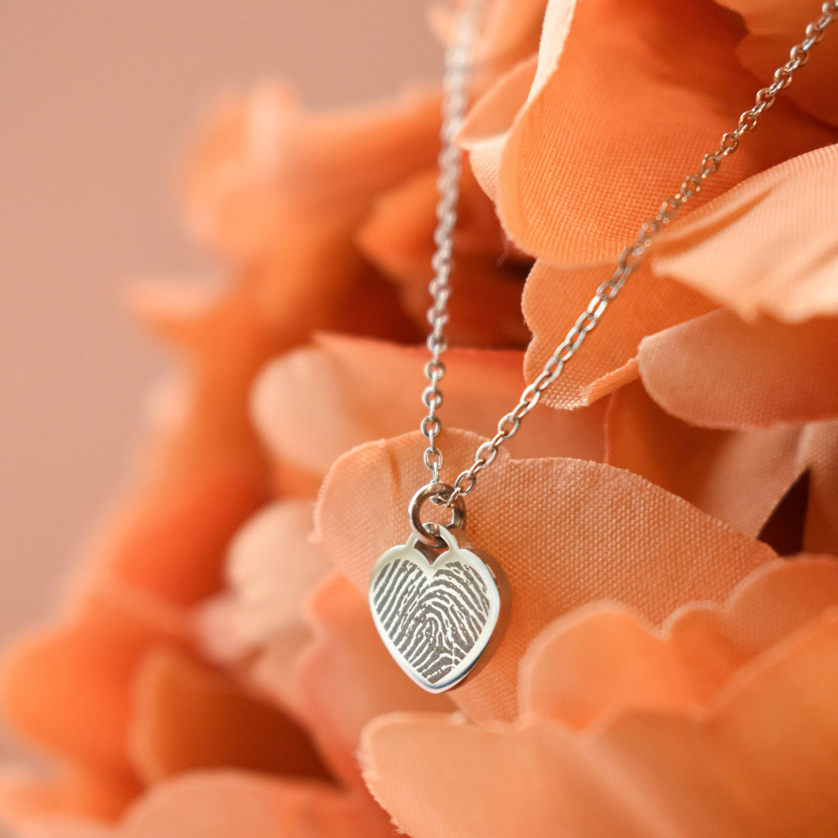 Kleine hart ketting vingerafdruk