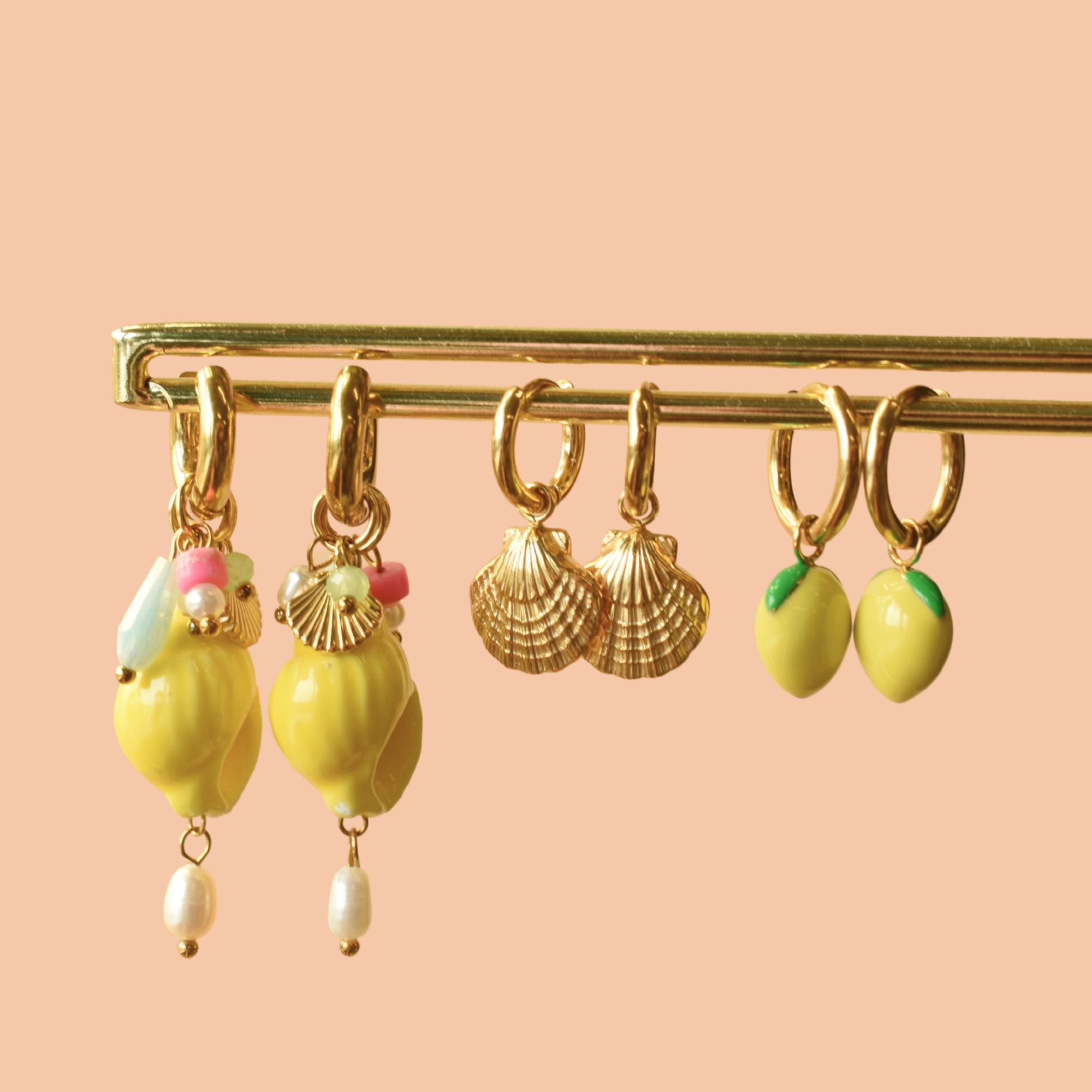 Zomerse oorbellen geel stainless steel kleur goud