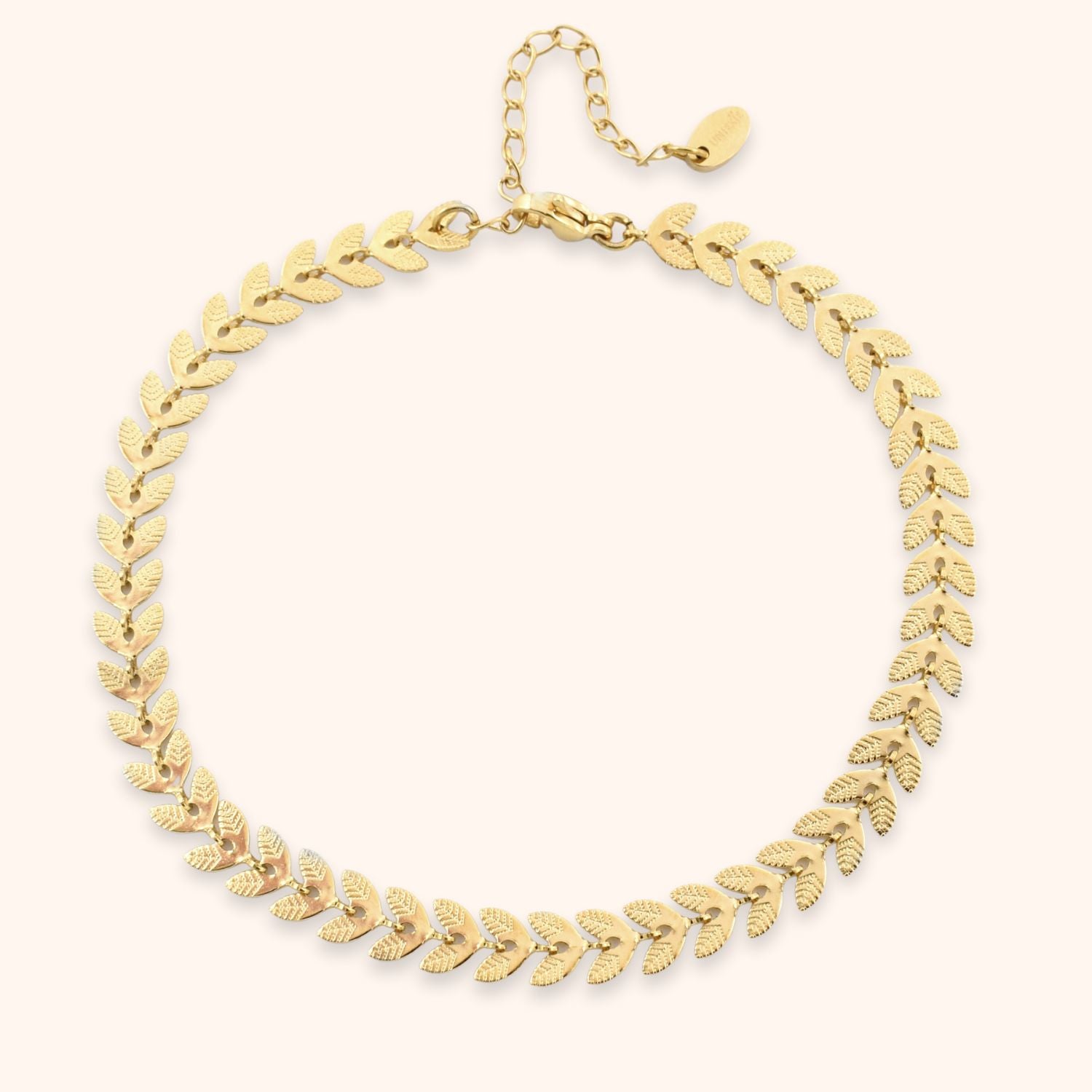 enkelbandje stainless steel blaadjes goud