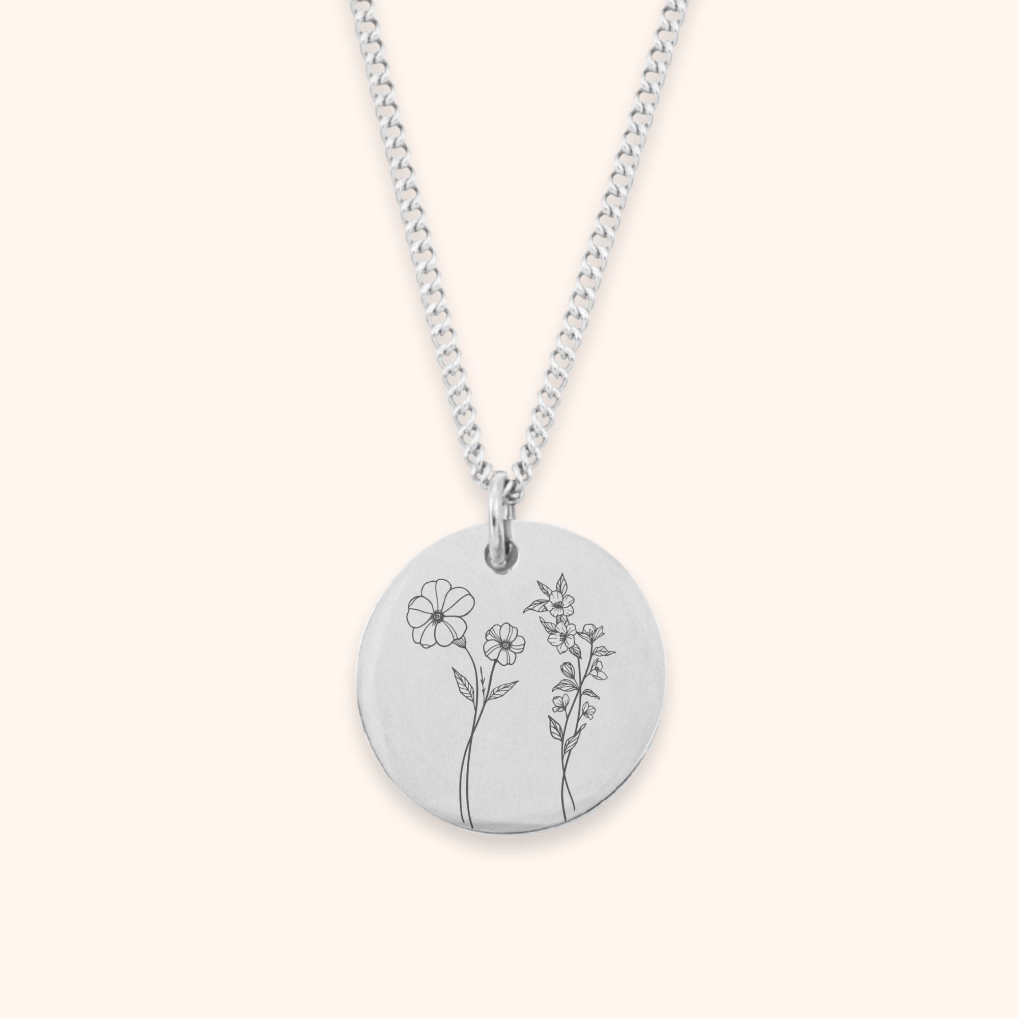 Ketting met 2 geboortebloemen gegraveerd op ronde hanger zilver stainless steel