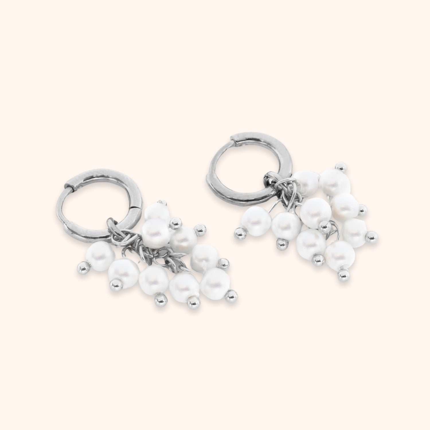 Hoops met veel kleine imitatie parels zilver rvs