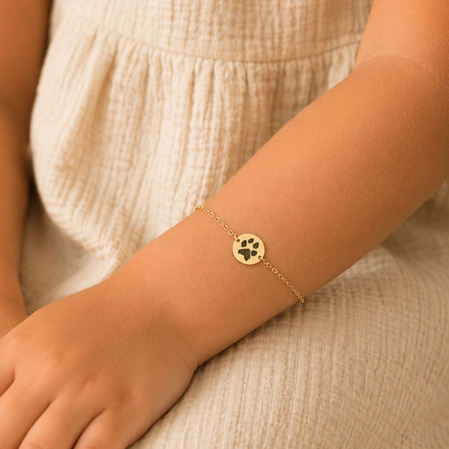Kinderarmband pootafdruk munt