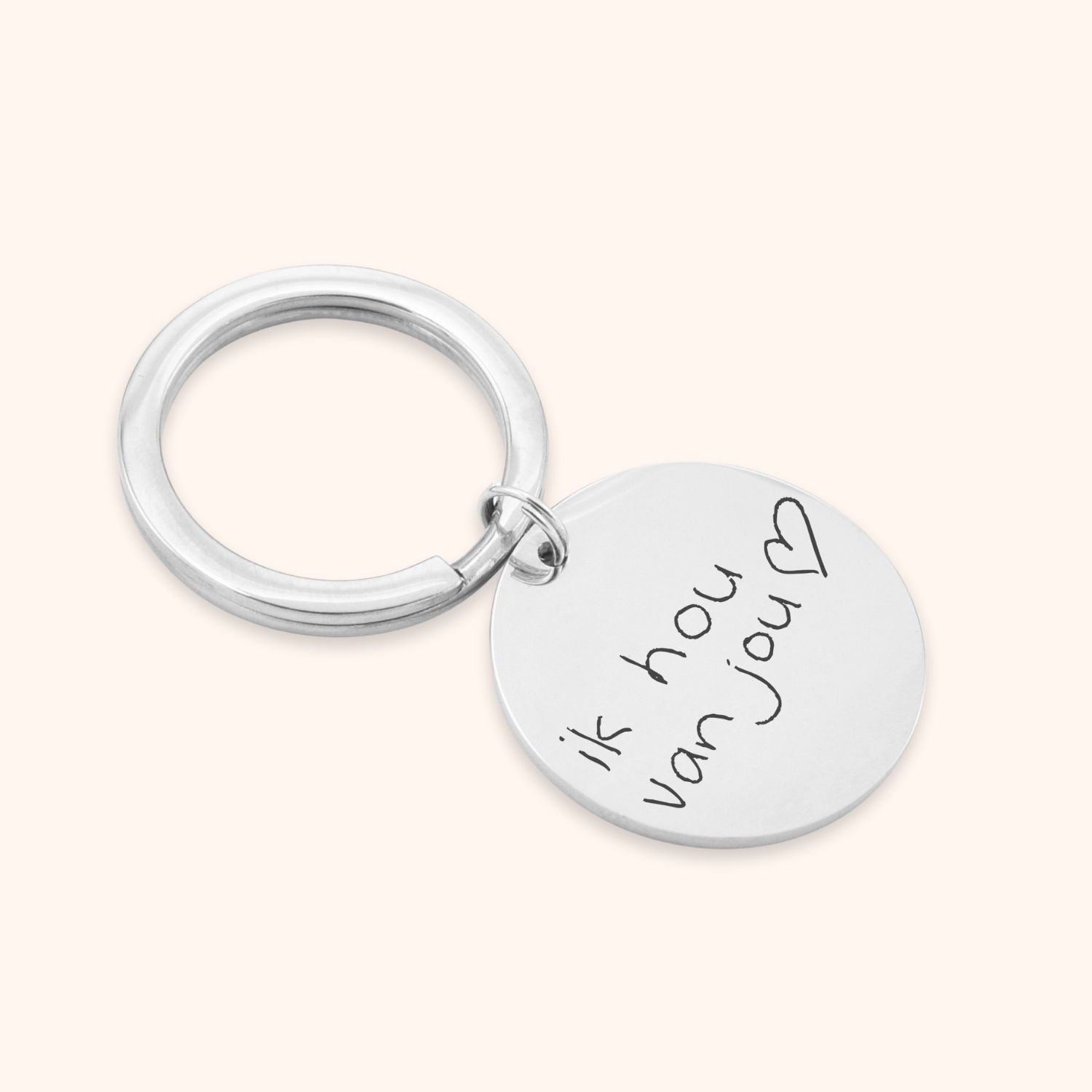 sleutelhanger gegraveerd met eigen handschrift