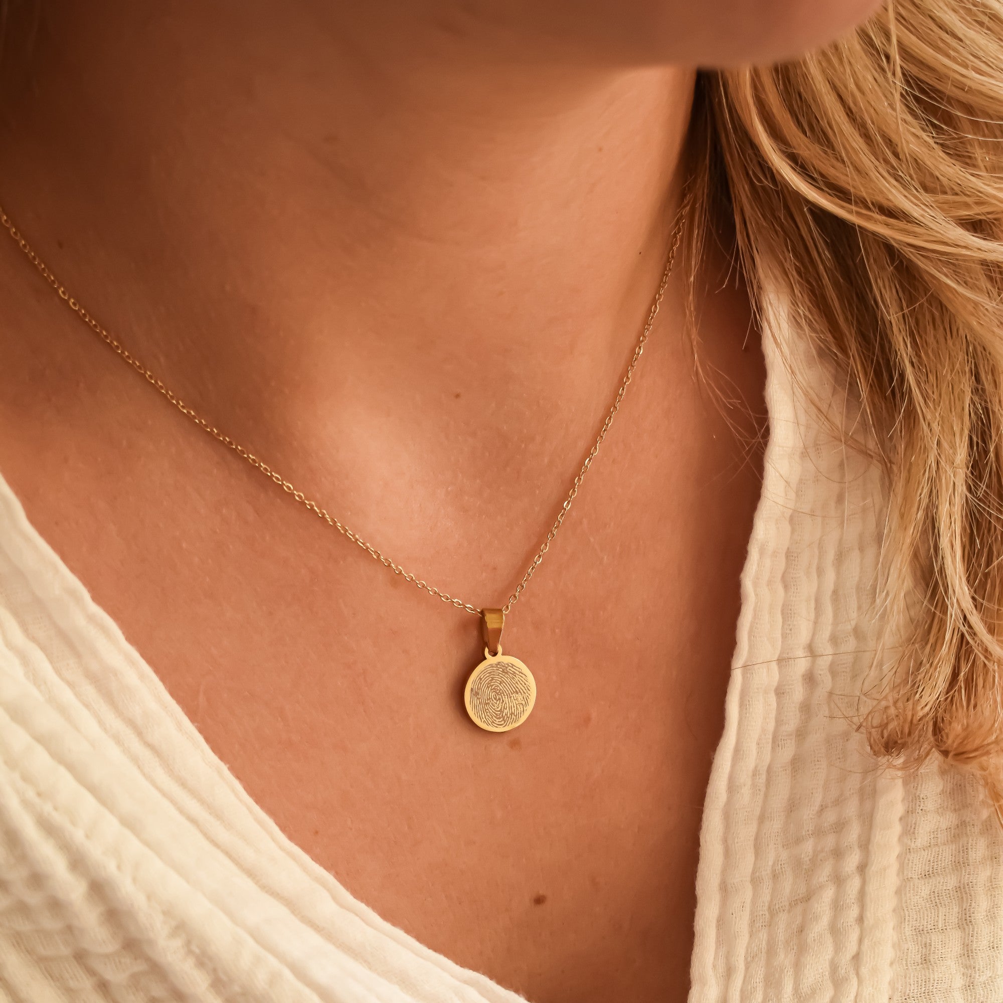 Ketting met vingerafdruk op ronde hanger stainless steel goud