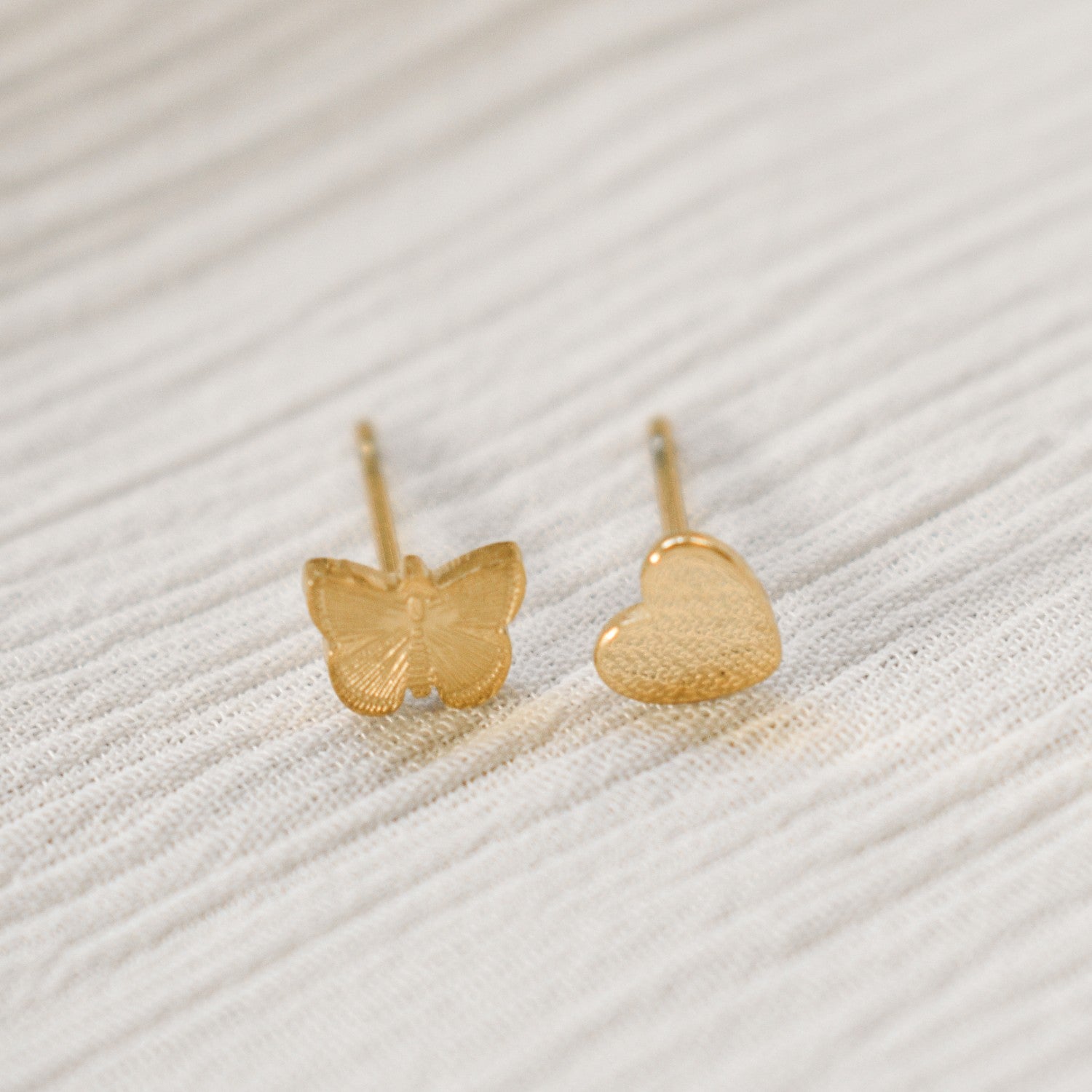 oorbel knopjes vlinder en hartje