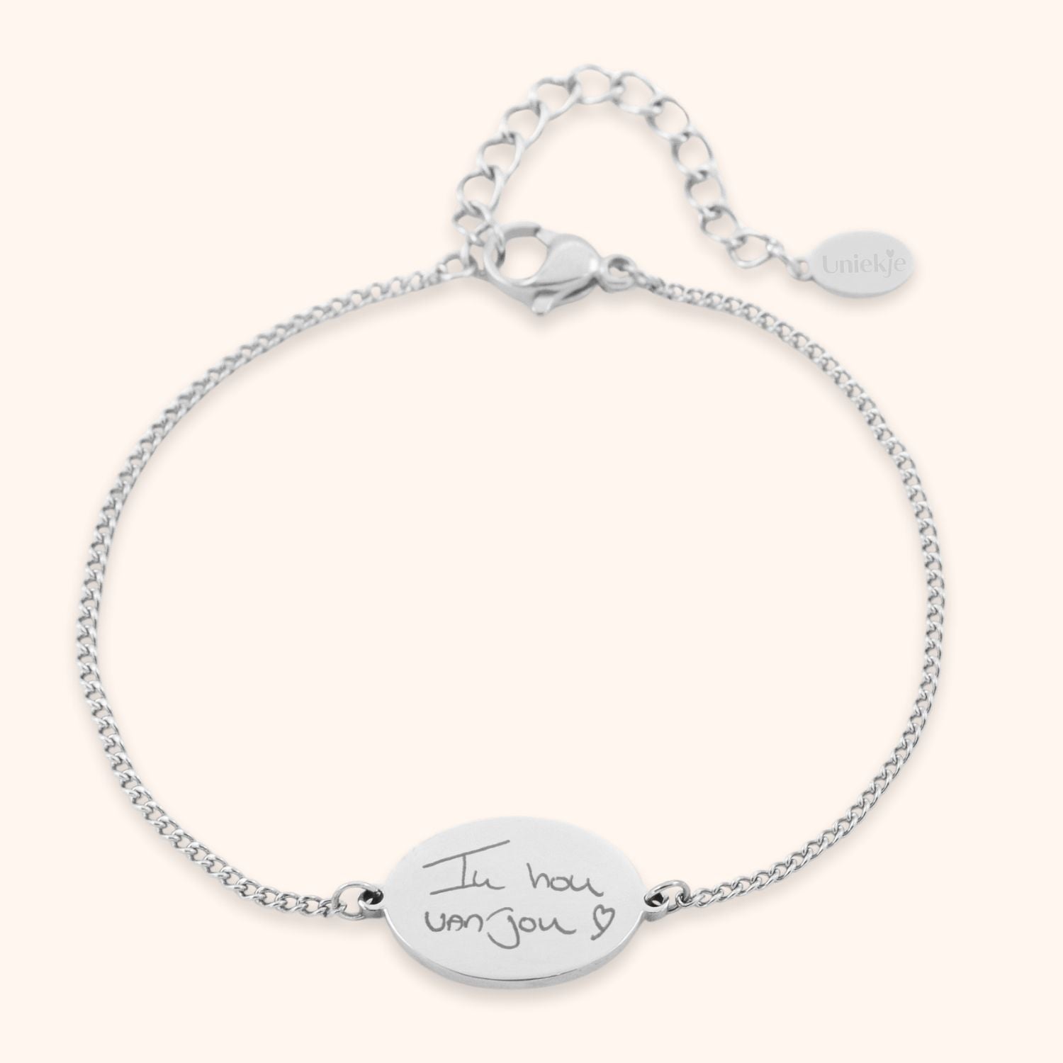 Armband met eigen handschrift gegraveerd op ovaal plaatje zilver stainless steel.