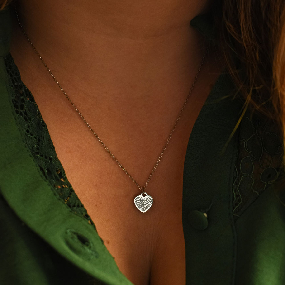 Kleine hart ketting vingerafdruk