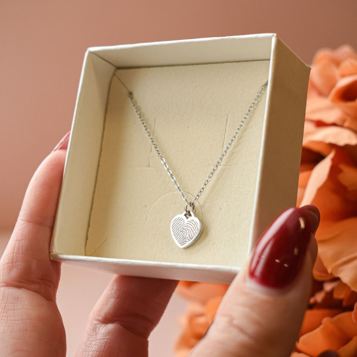Kleine hart ketting vingerafdruk