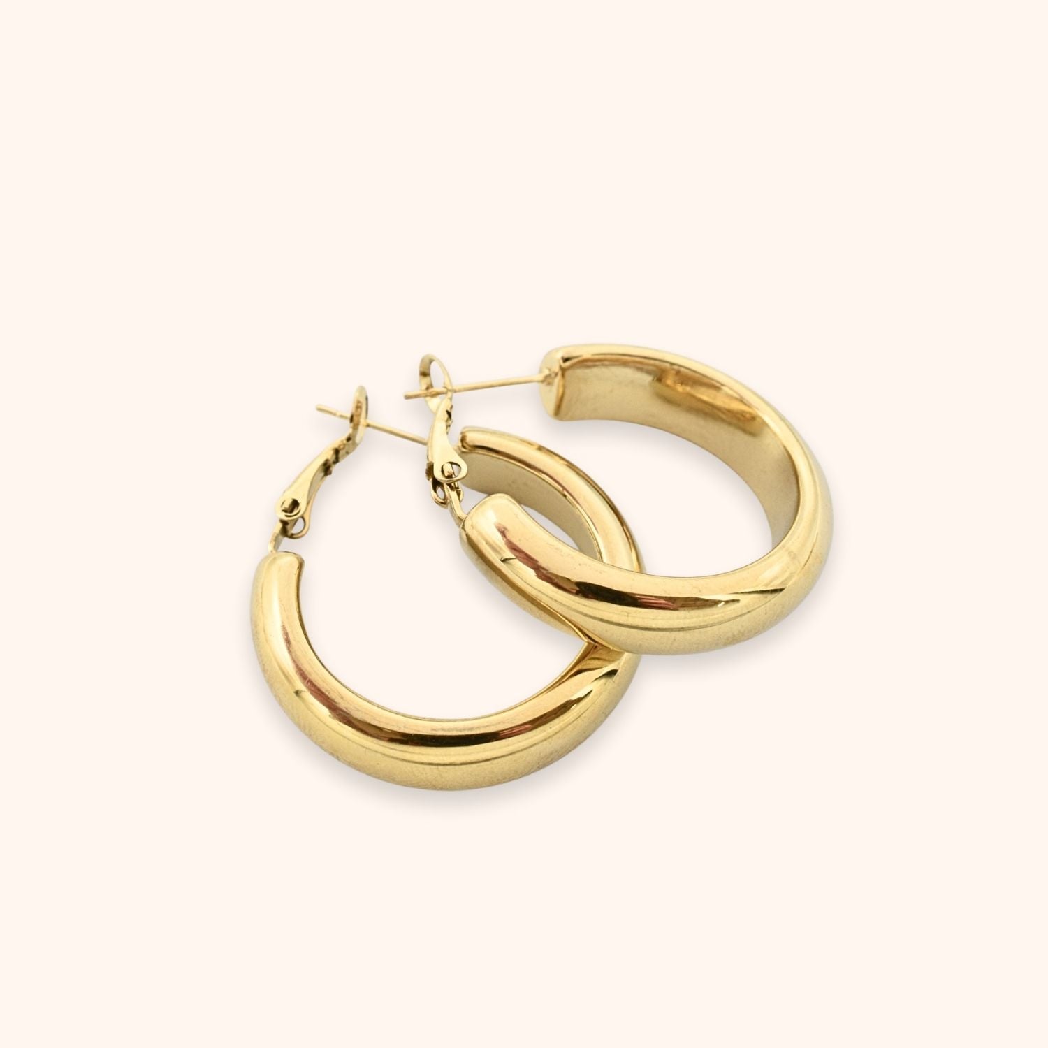 Oorbellen dikke hoops 2,8mm kleur goud stainless steel 