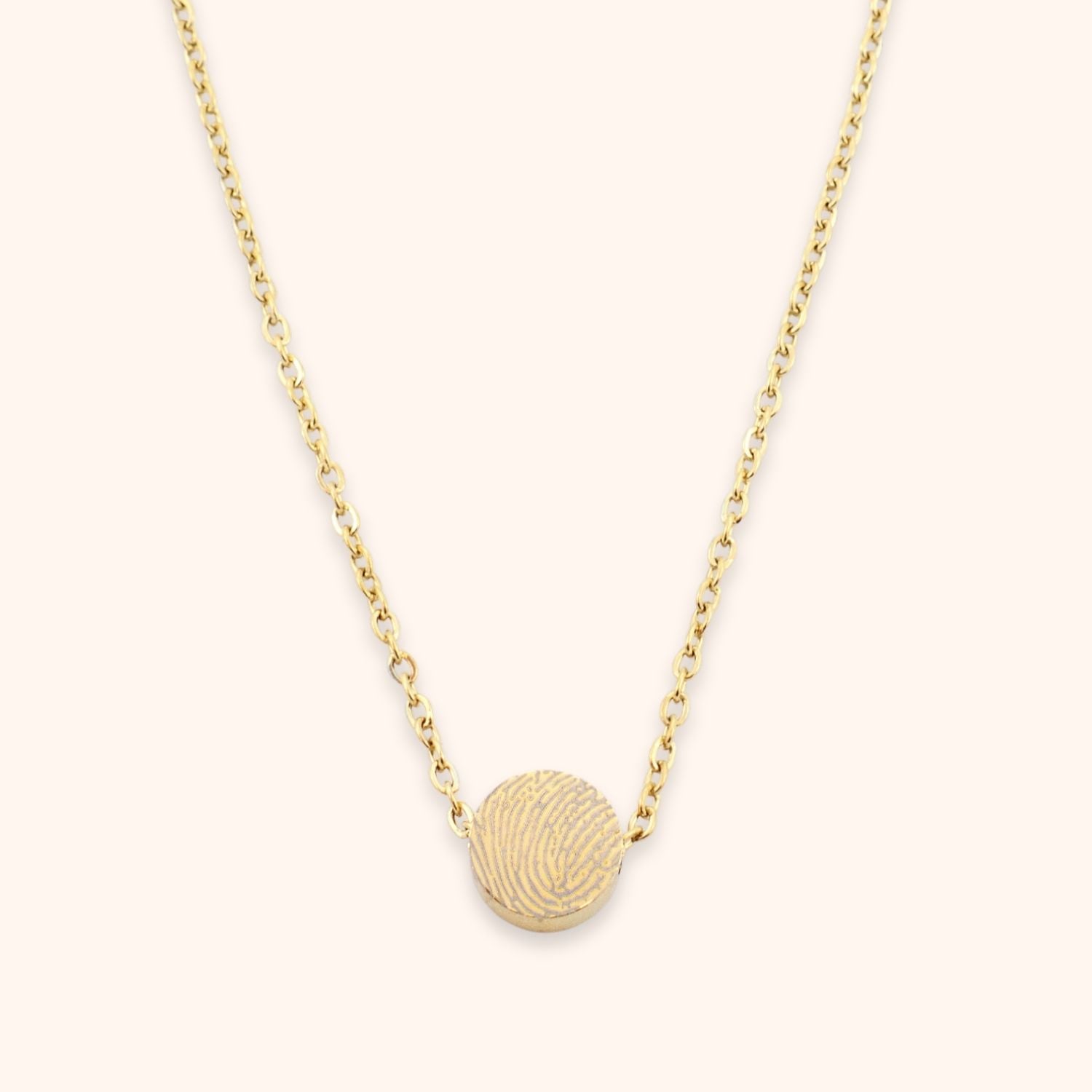 Fijne ketting met rond kraaltje gepersonaliseerd met een vingerafdruk goud