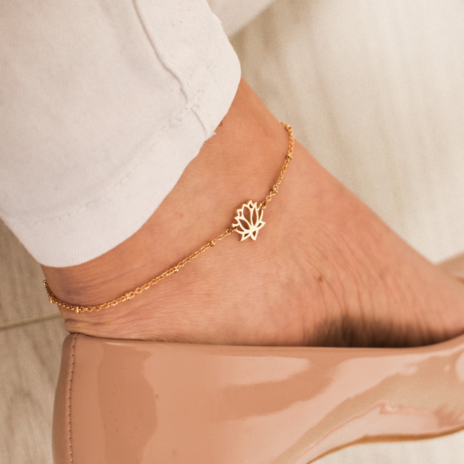 enkelbandje schakel bolletjes lotus bloem goud