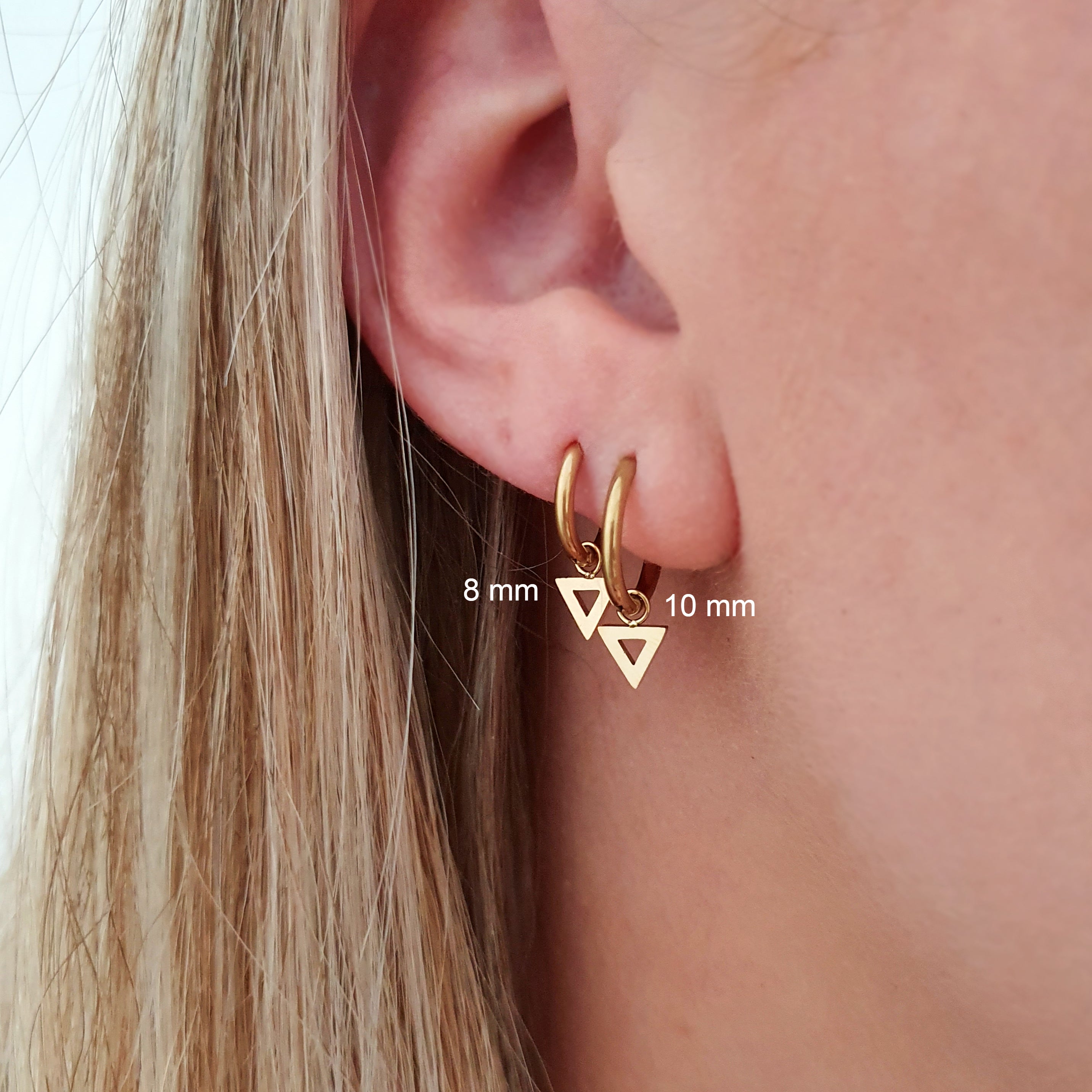Earrings open triangle