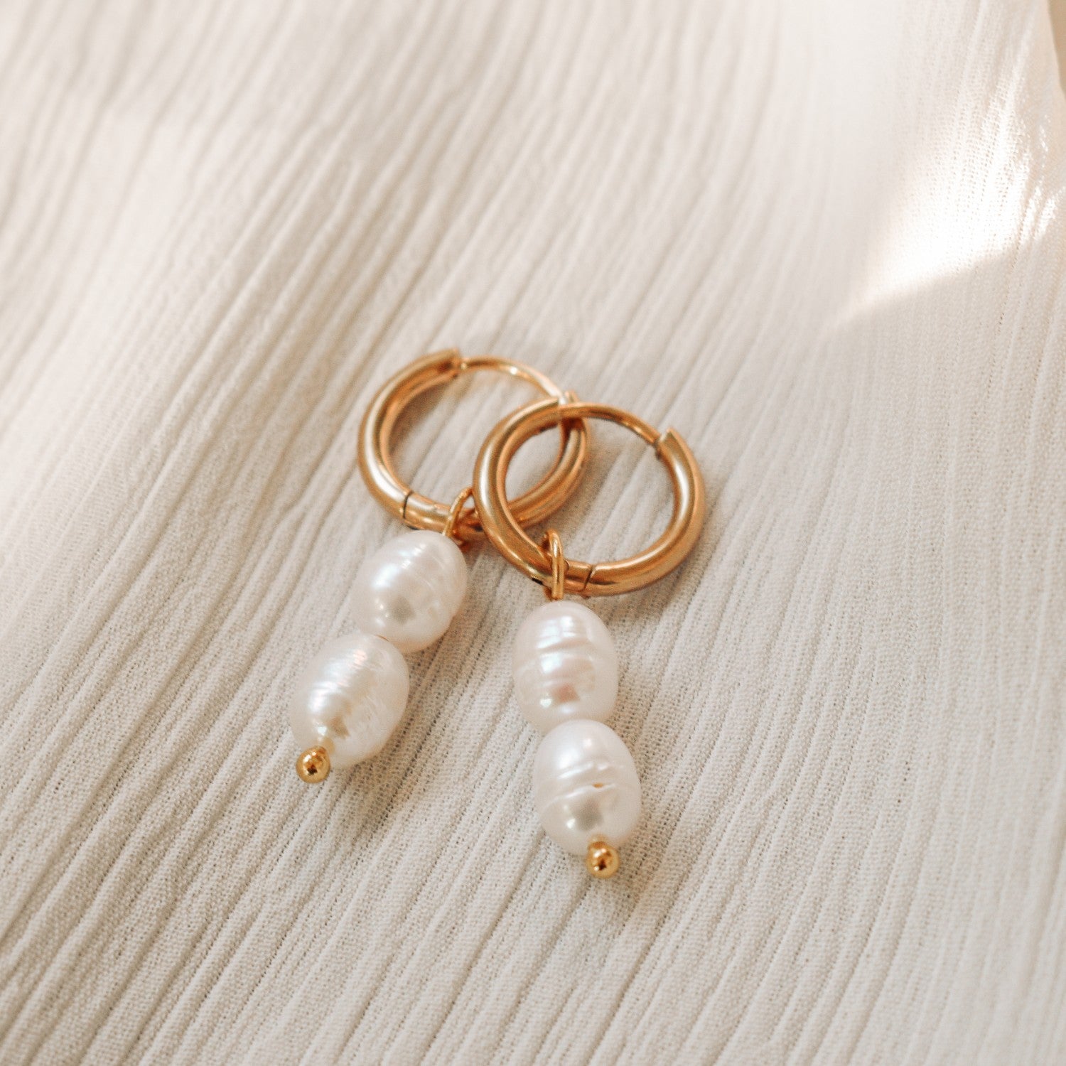 Parel oorbellen goud